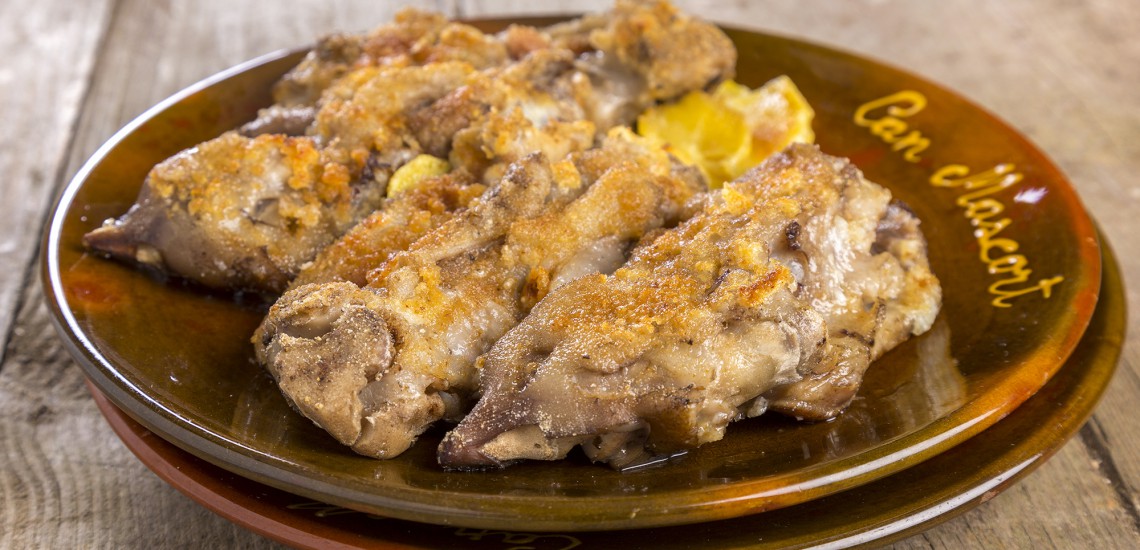 Peus de porc gratinats amb allioli